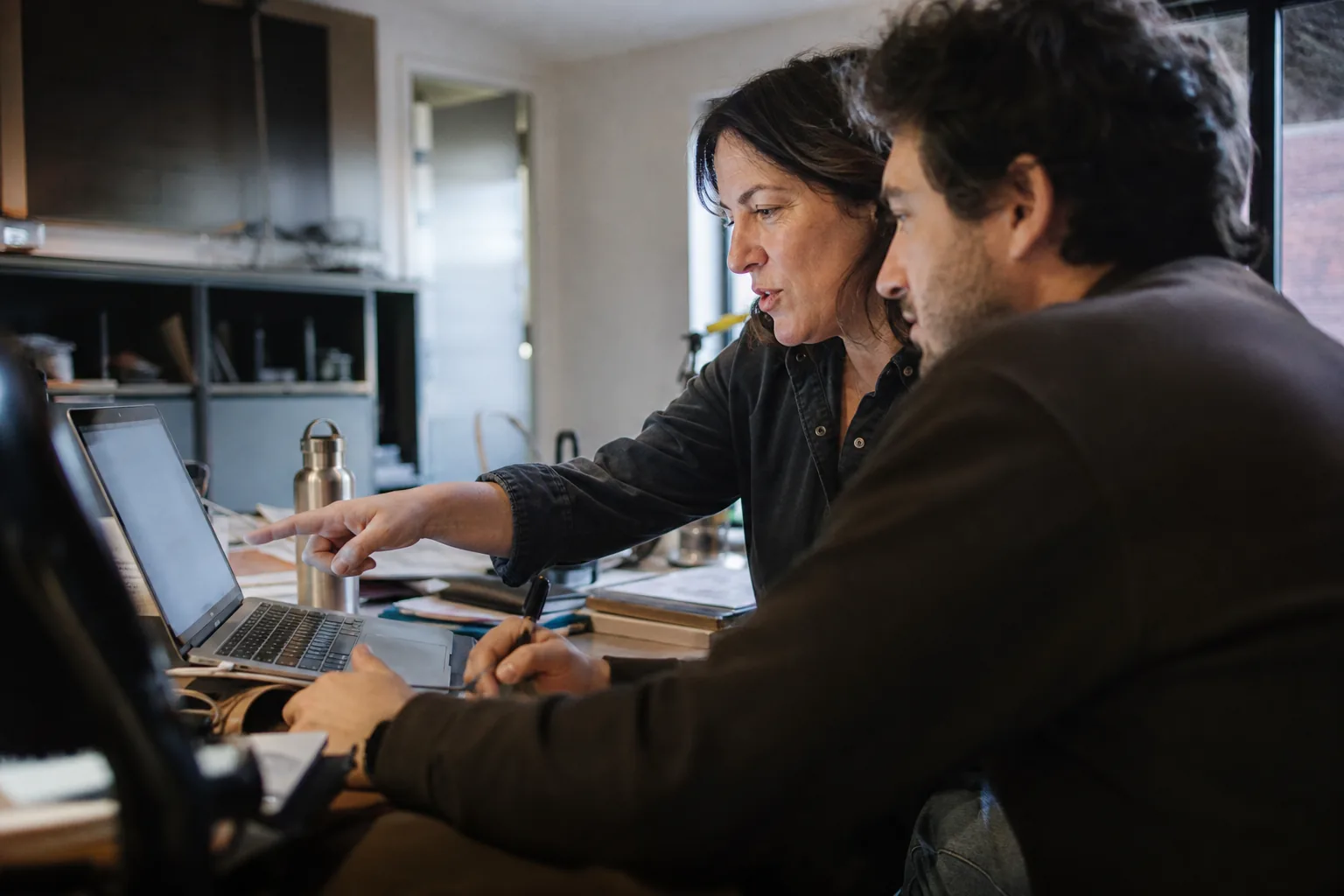 Customer and onboarding lead checking first live results together